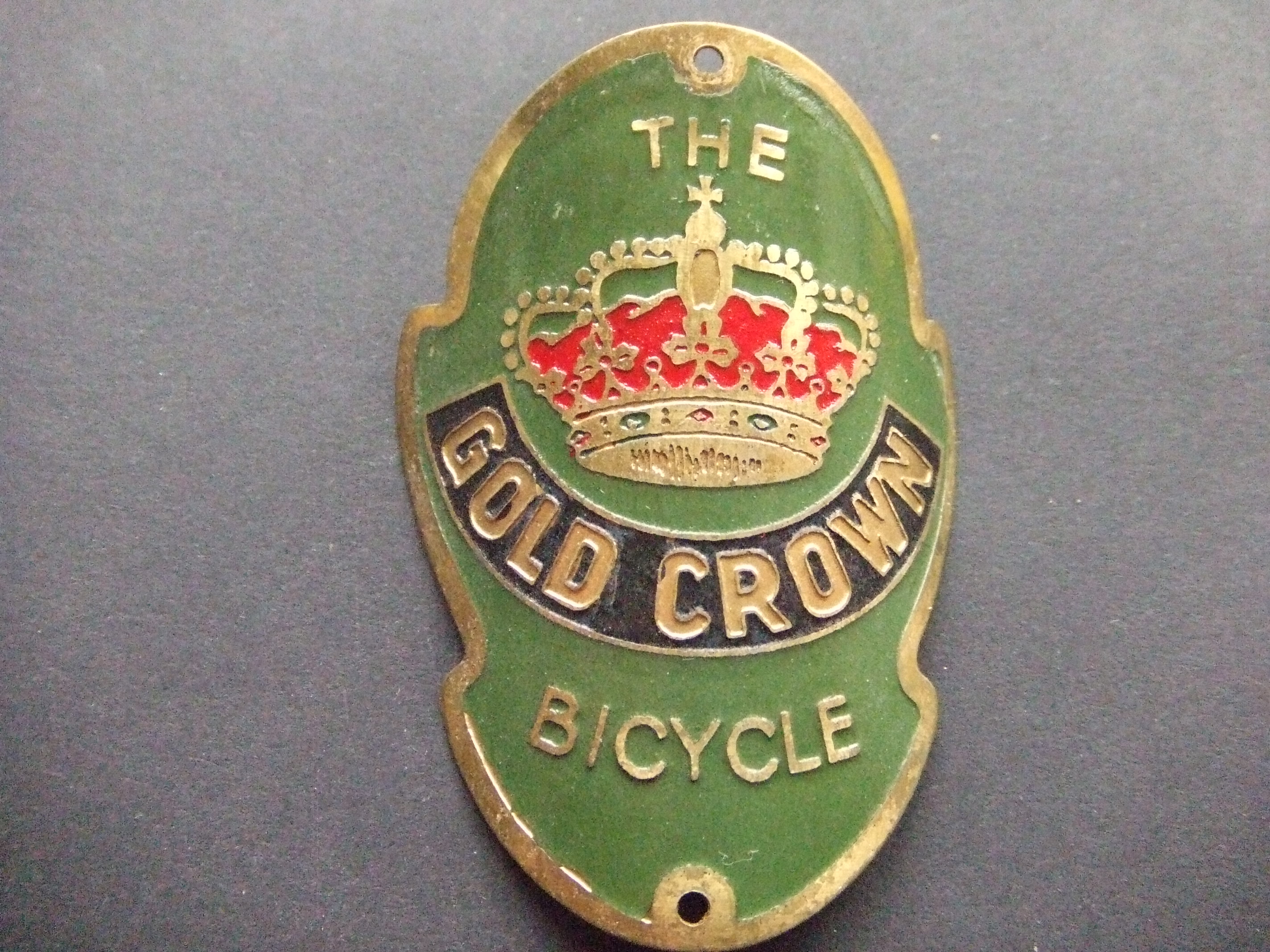 Gold crown bicycle Engeland balhoofdplaatje